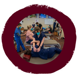 OMM Fellow treating a student at the Lebanon campus OMM Lab