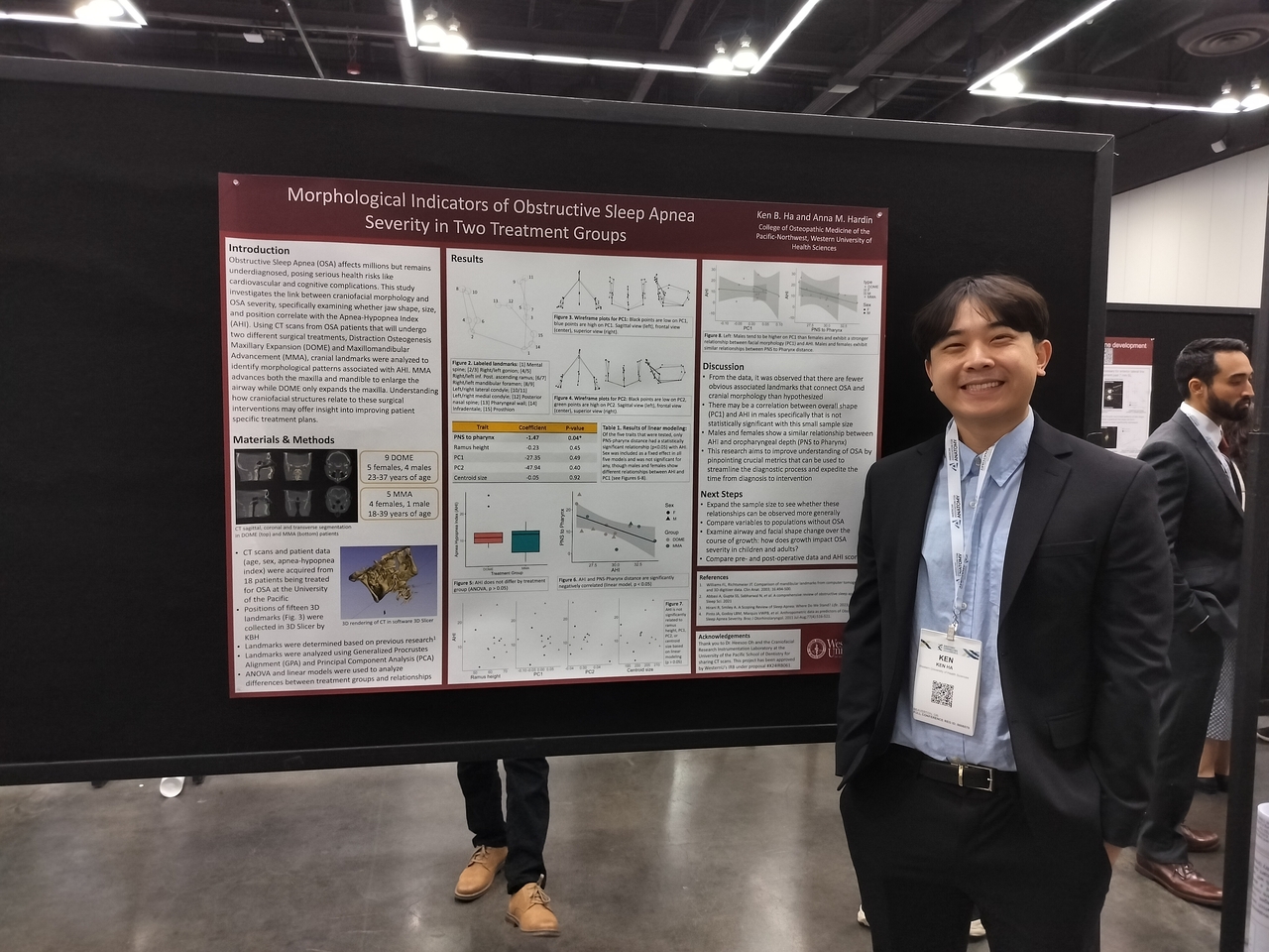 Ken Ha stands with his poster on facial morphology in people with obstructive sleep apnea
