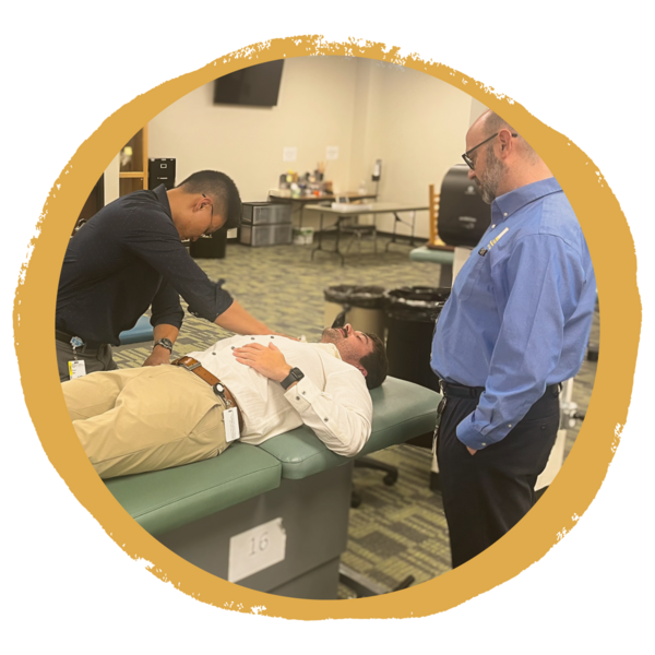 OMM Fellows participating in consensus training under the supervision of PI Dr. Loveless for a clinical trial